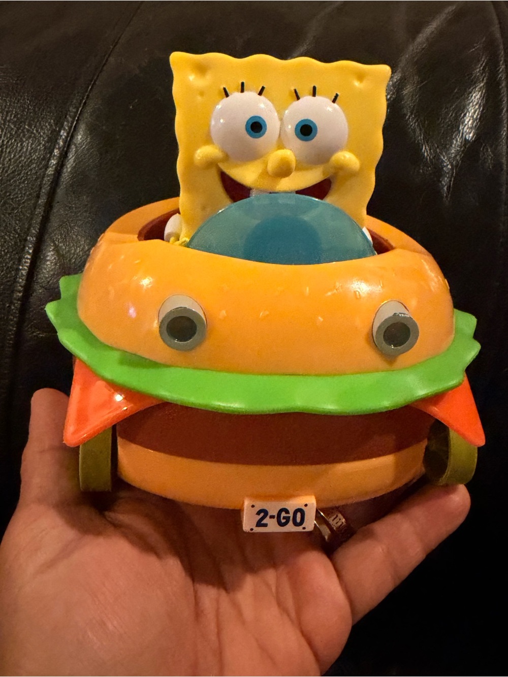 SpongeBob SquarePants Yellow Figure in Orange & Green Toy Car with Blue Wheel no